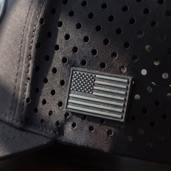 Raised On It | America 250 | Blackout Performance Hat — Subdued Flag