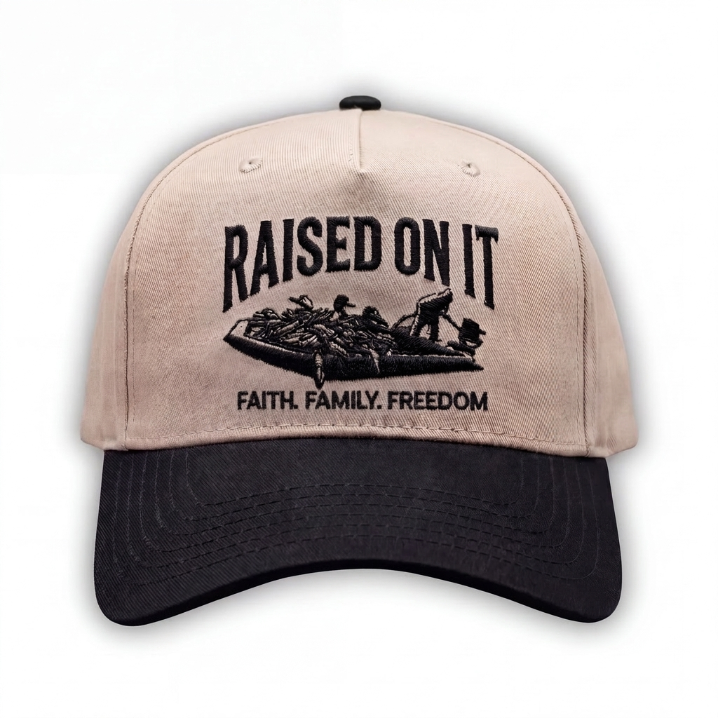 Outboard Legacy Hat in Mudboat Black (black brim, black stitch) with embroidered Raised On It mud boat logo and Faith Family Freedom