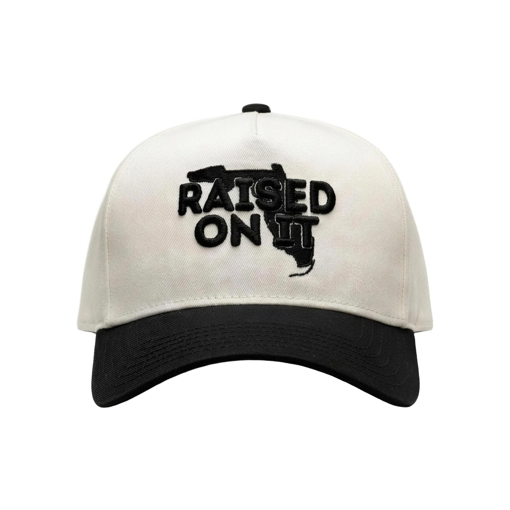 Raised On It Florida Logo embroidered trucker hat in White/Black, canvas white crown, black bill, black Florida logo stitch