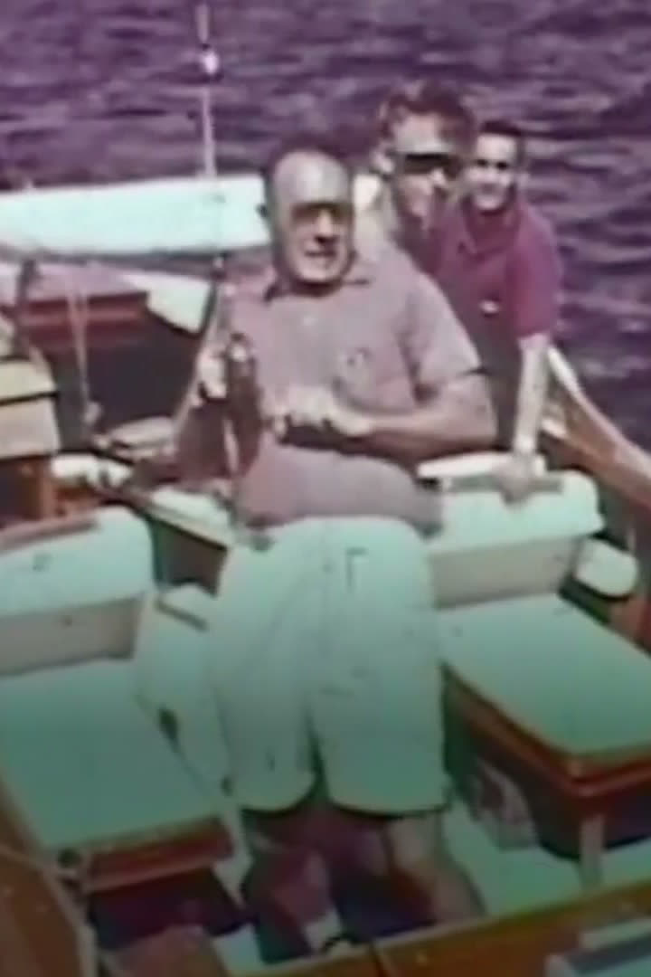 Vintage film frame — three men fishing off a boat, All American Summer